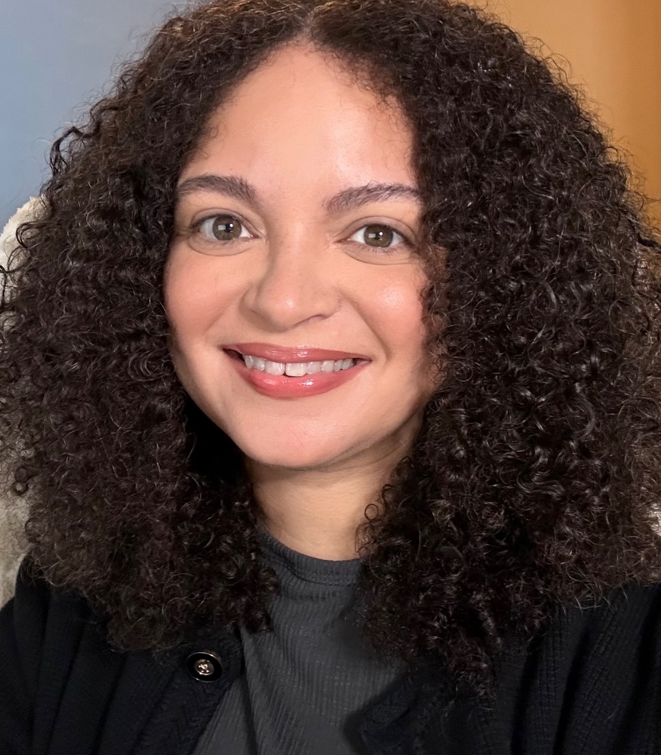 A portrait of UU World Digital Editor Maryann Batlle.