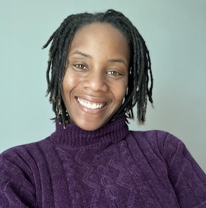 A photo portrait of Jasmine Vaughn-Hall.